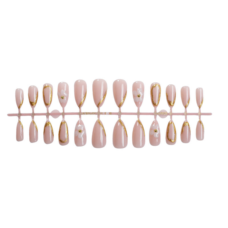 Luxuriöses Press-On Nail Art Set mit goldenen Akzenten Brehn