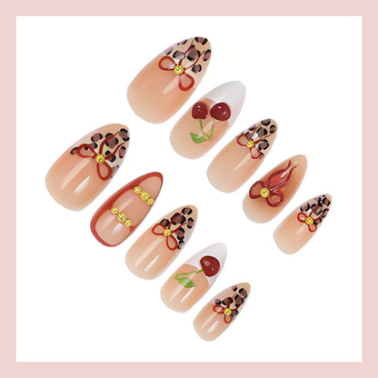 Kunstnagelset mit kreativen Schleifen- und Fruchtdesigns Brehn
