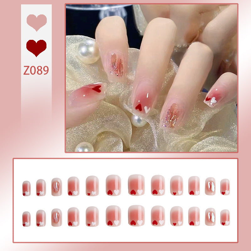 Kunstnagelset mit elegantem French-Tipp und Glitzerakzenten Brehn
