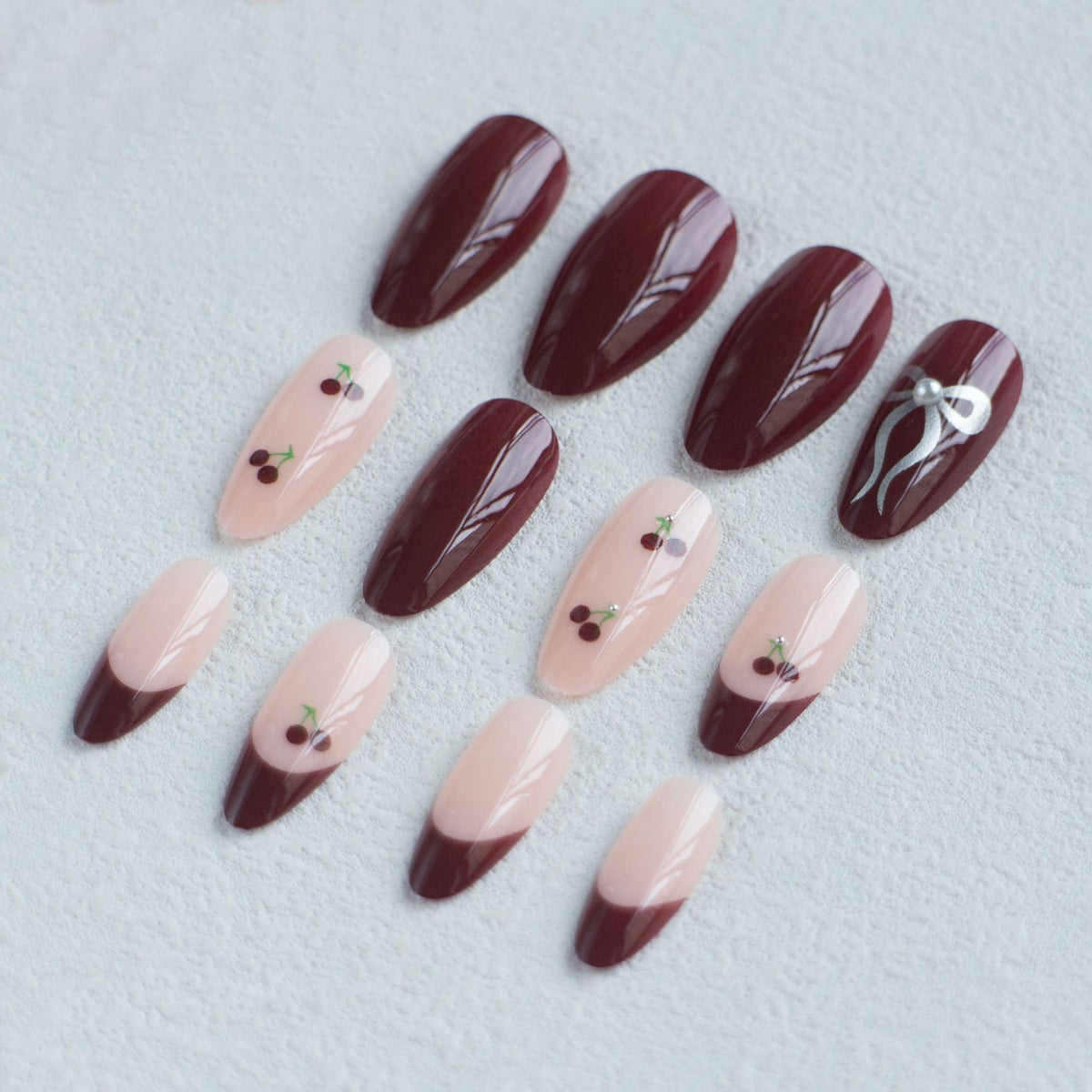 Elegantes Schleifen- und Kirschdesign Nagelkunstset