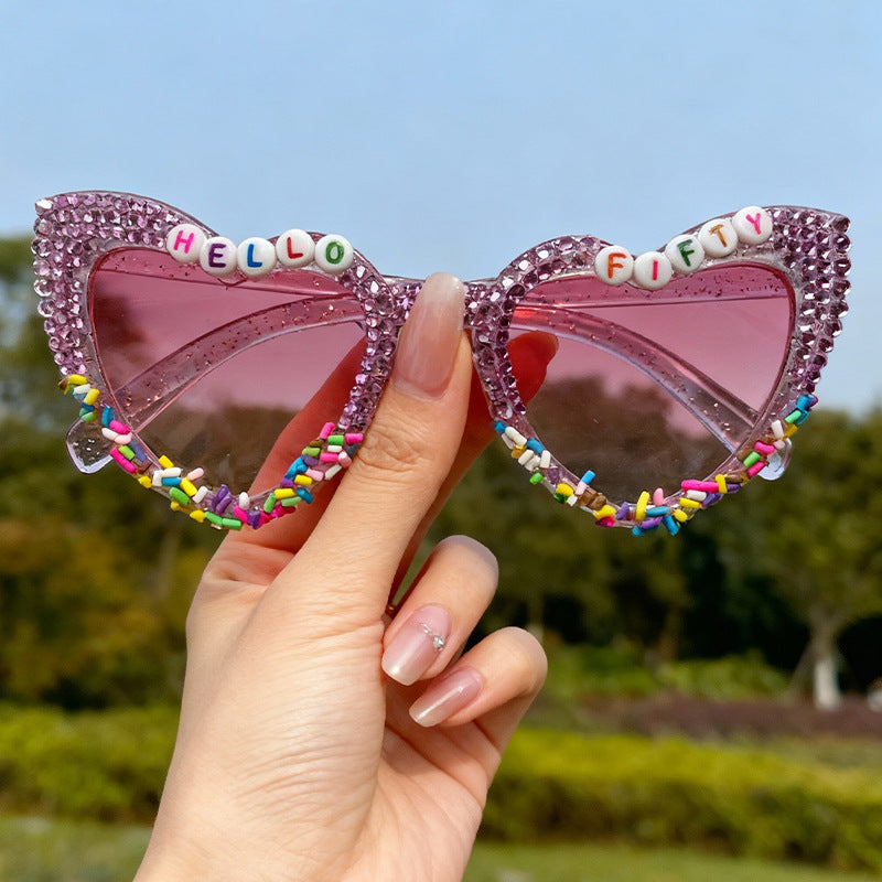 Dekorative Katzenaugen-Sonnenbrille mit Rhinestones Brehn