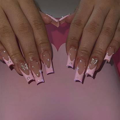 Kunstnagelset mit stilvollen 3D-Perlen- und Glitzerverzierungen Brehn
