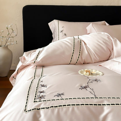 Besticktes Luxus-Satin-Bettbezug-Set mit dekorativen Kissenbezügen