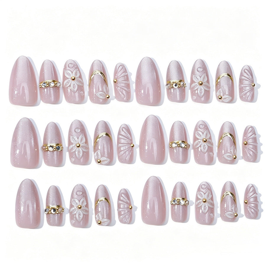 Elegantes Kunstnagelset mit Blumen- und Glitzerelementen Brehn