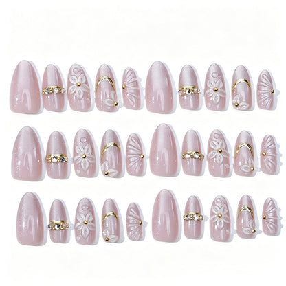 Elegantes Kunstnagelset mit Blumen- und Glitzerelementen Brehn