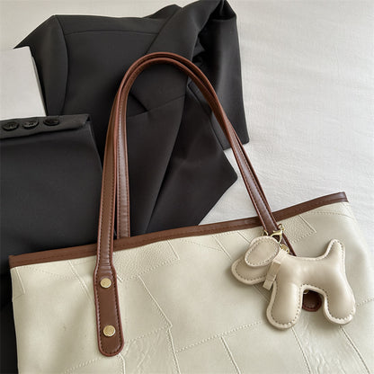 Stylische strukturierte Tragetasche mit dekorativem Charme