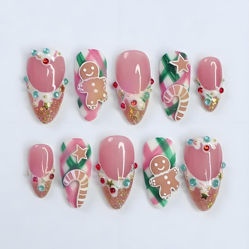 Kunstnagelset mit festlichen Weihnachtsmotiven und Glitzerakzenten Brehn