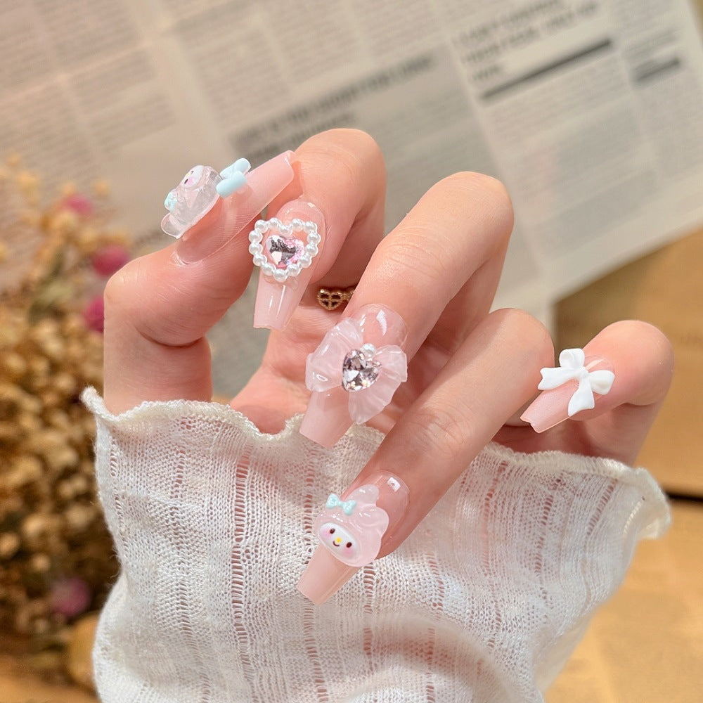 Elegante Stiletto-Press-On-Nägel mit floralen und Glitzer-Akzenten Brehn