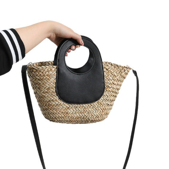 Damen Handtasche aus geflochtenem Material mit Lederdetails Brehn