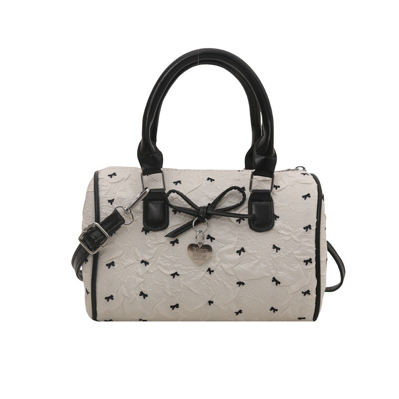 Bogen-verzierte Handtasche