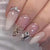 Glamouröse Stiletto Kunstnägel mit Glitzer-Details Brehn