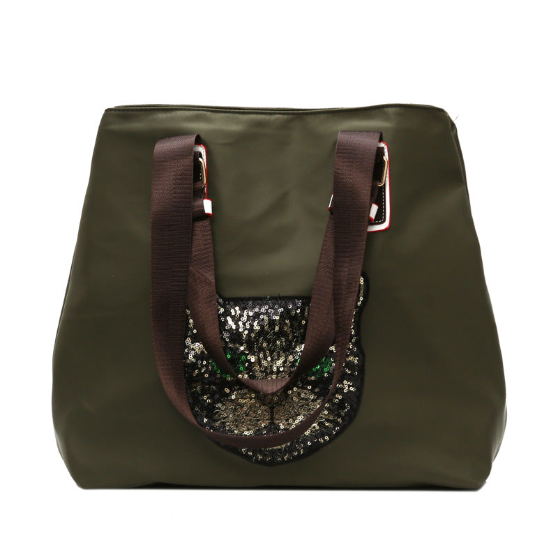 Stylische mit Pailletten dekorierte Tragetasche