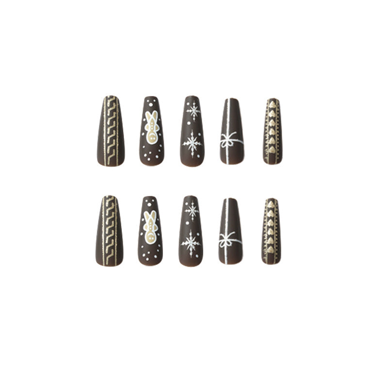 Künstliche Nagelkunst mit festlichem Lebkuchen-Design Brehn