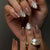 Kunstnagelset mit eleganten Goldspitzen und kunstvollen Verzierungen Brehn