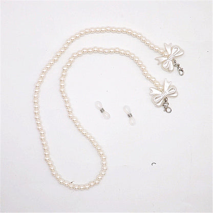 Elegante Perlen-Brillenkette mit Schleifenanhängern Brehn