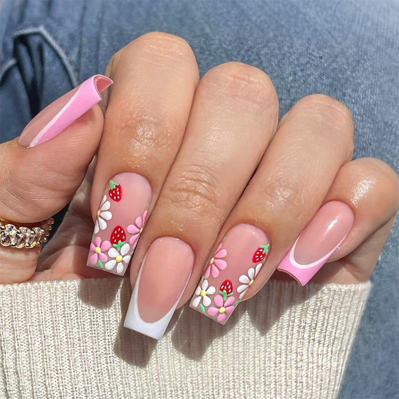 Kunstnagelset mit bunten Blüten und kreativem French-Design Brehn