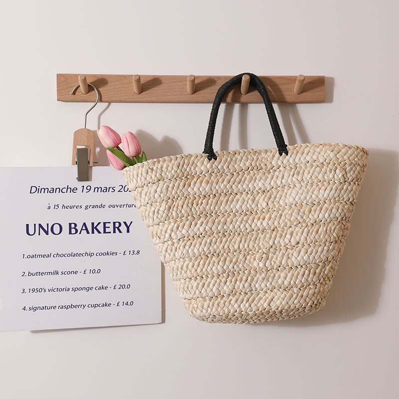 Elegante Basttasche mit Kontrastgriffen Brehn
