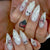 Kunstvolles Nagelset mit Edelstahl-Applikationen Brehn