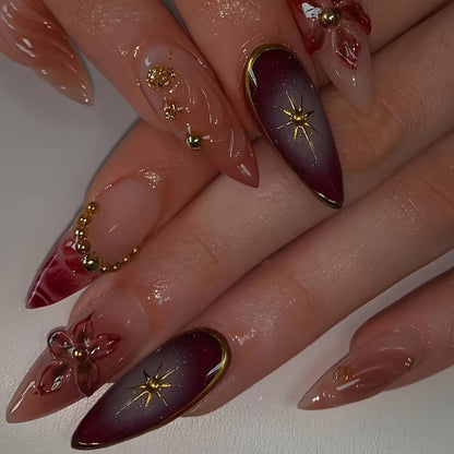 Künstlerische Stiletto-Press-On-Nägel mit floralen und sternförmigen Designs Brehn