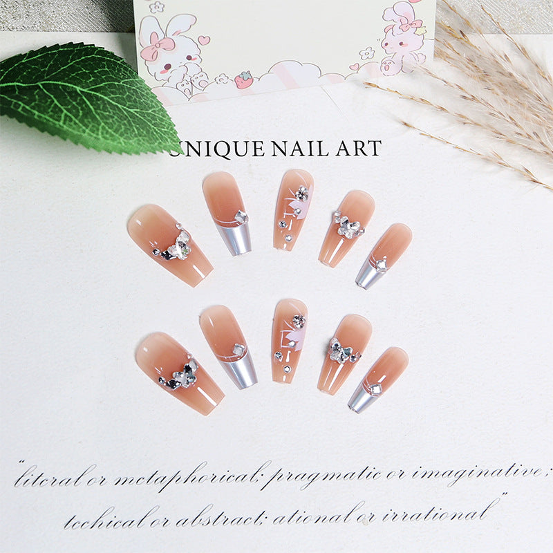 Kunstnagelset mit glamourösen Blüten- und Glitzerverzierungen Brehn