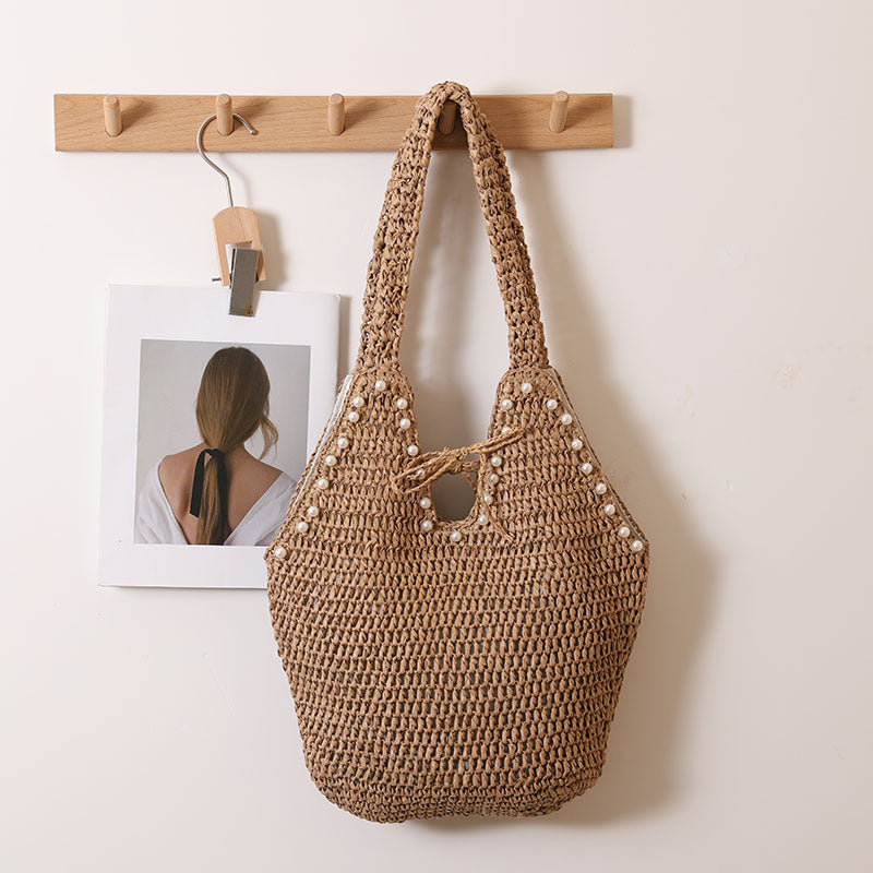 Handtasche mit Perlendekor und Innovativem Verschluss Brehn