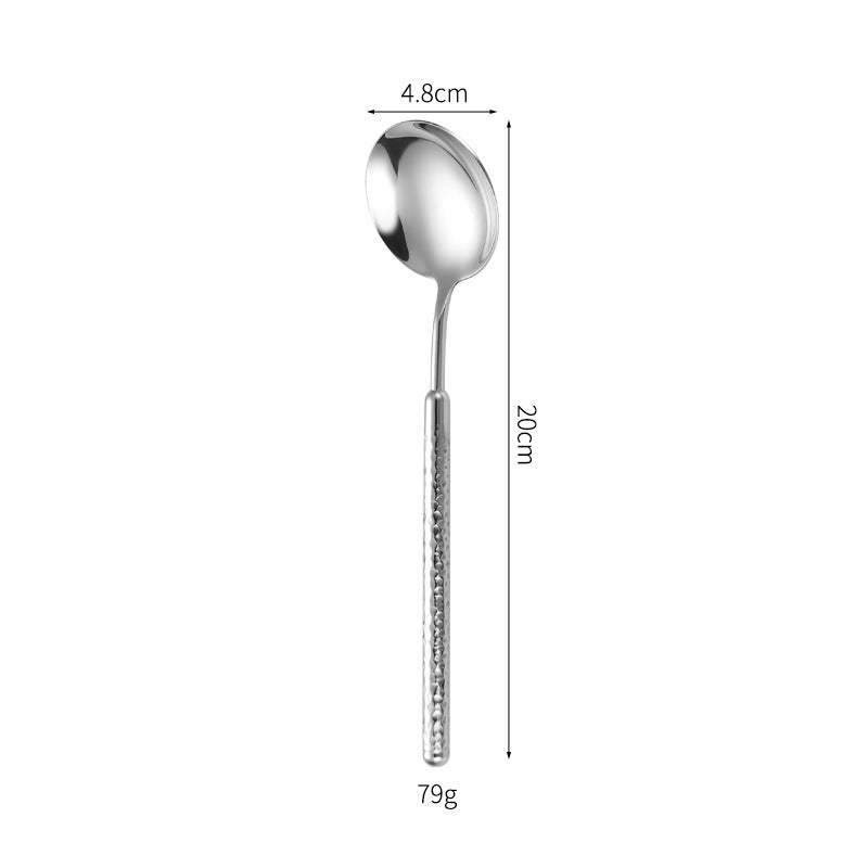 Eleganter Dessertlöffel mit Kunstvollem Griffdesign Brehn