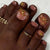 Floral Design Press-On Nagelset mit goldenen Akzenten Brehn