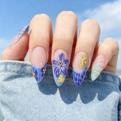 Kunstnagelset mit zeitlosen Blumendesigns und eleganten Akzenten Brehn
