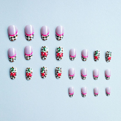 Künstlerische Leopard- und Kirsch-Nagelkunst