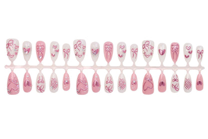 Kunstnagelset mit romantischen Schleifen- und Herzdesigns Brehn