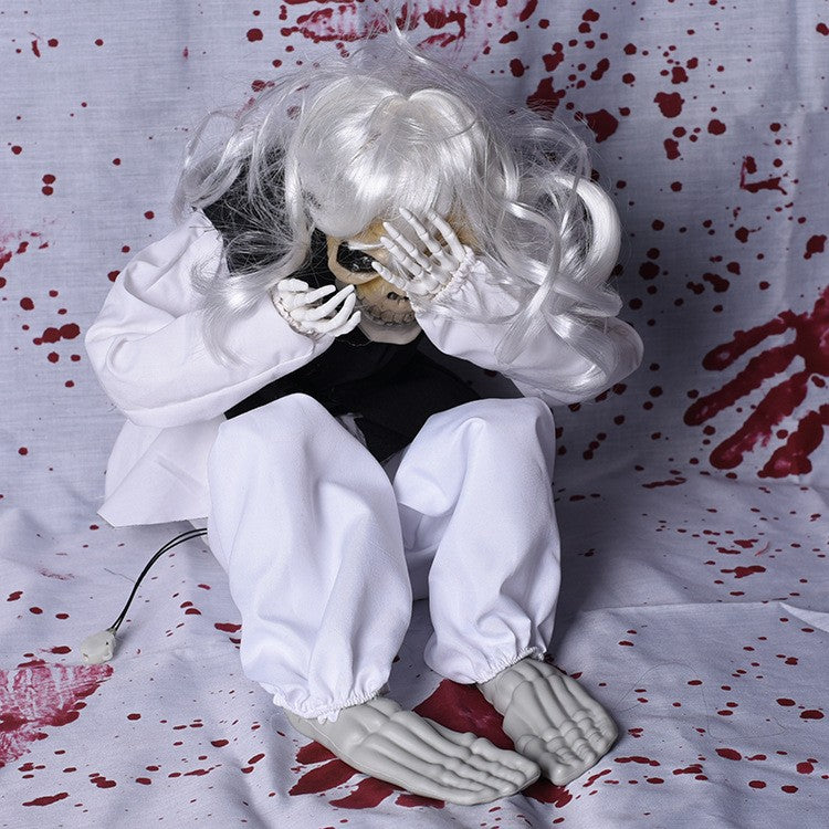 Gruselige sitzende Skelettpuppe Brehn