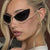 Damen extravagant geformte Cat-Eye Sonnenbrille mit funkelnden Applikationen Brehn