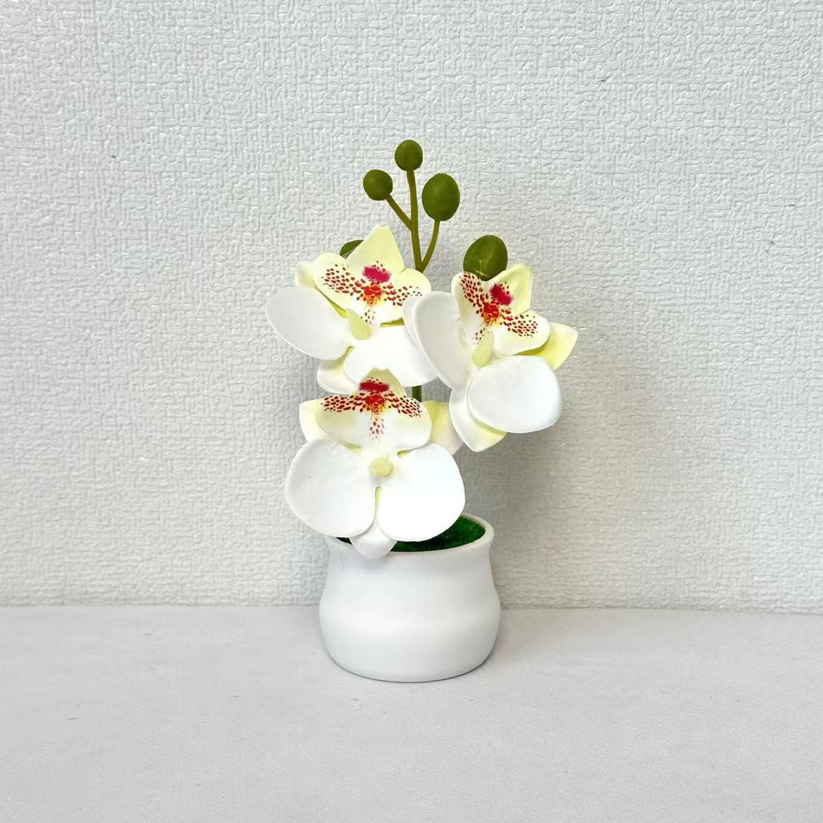 Elegante künstliche Orchideen Dekoration