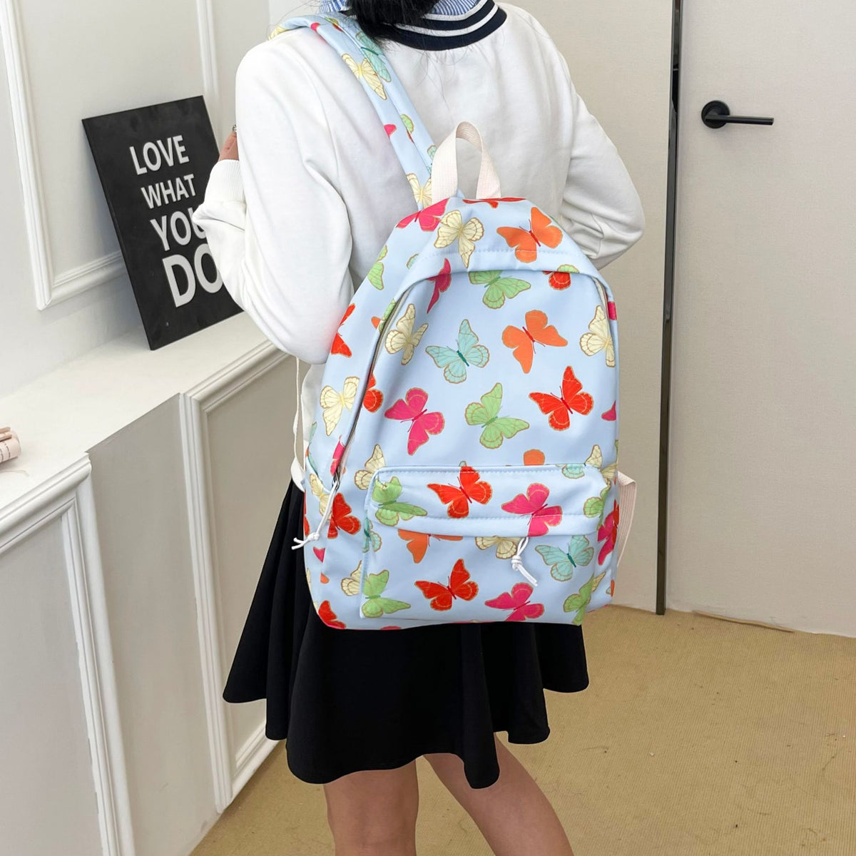 Lebhafte Schmetterlingsmuster-Rucksack Brehn
