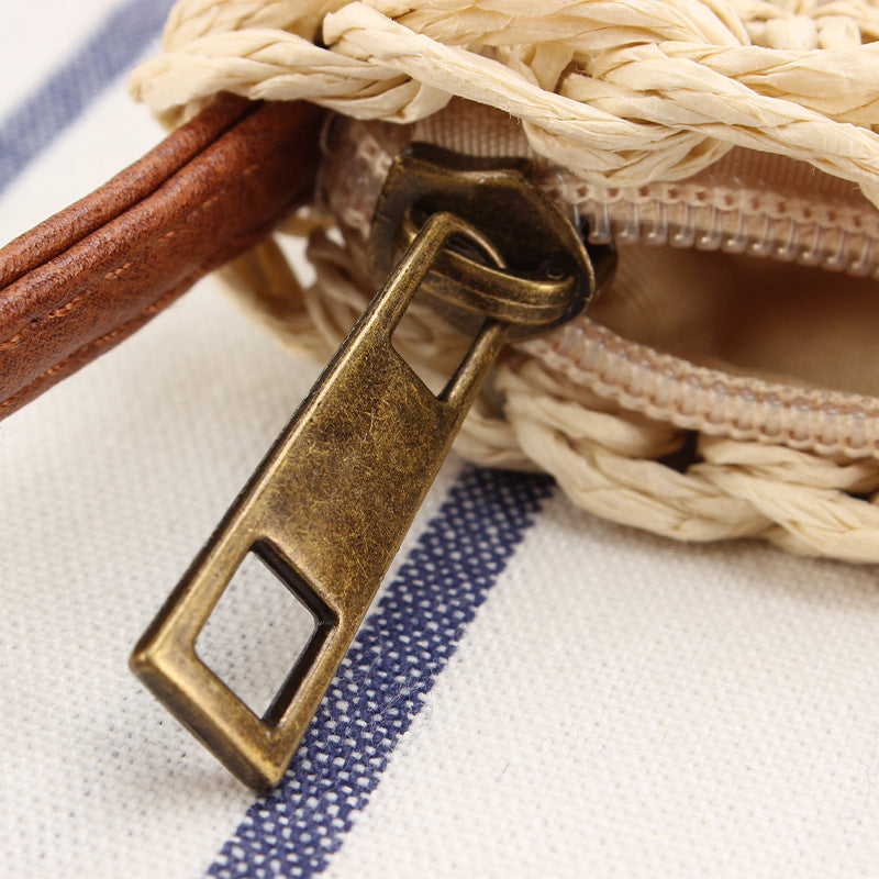 Geflochtene Schultertasche mit Lederakzenten Brehn