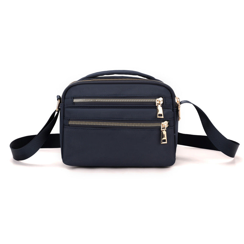 Multi-Reißverschluss-Crossbody-Organizer-Tasche Brehn