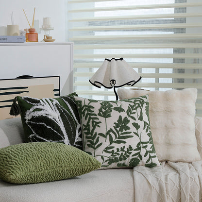 Quadratisches Zierkissen mit erhabenem Blatt‑Tufting und Quasten Brehn