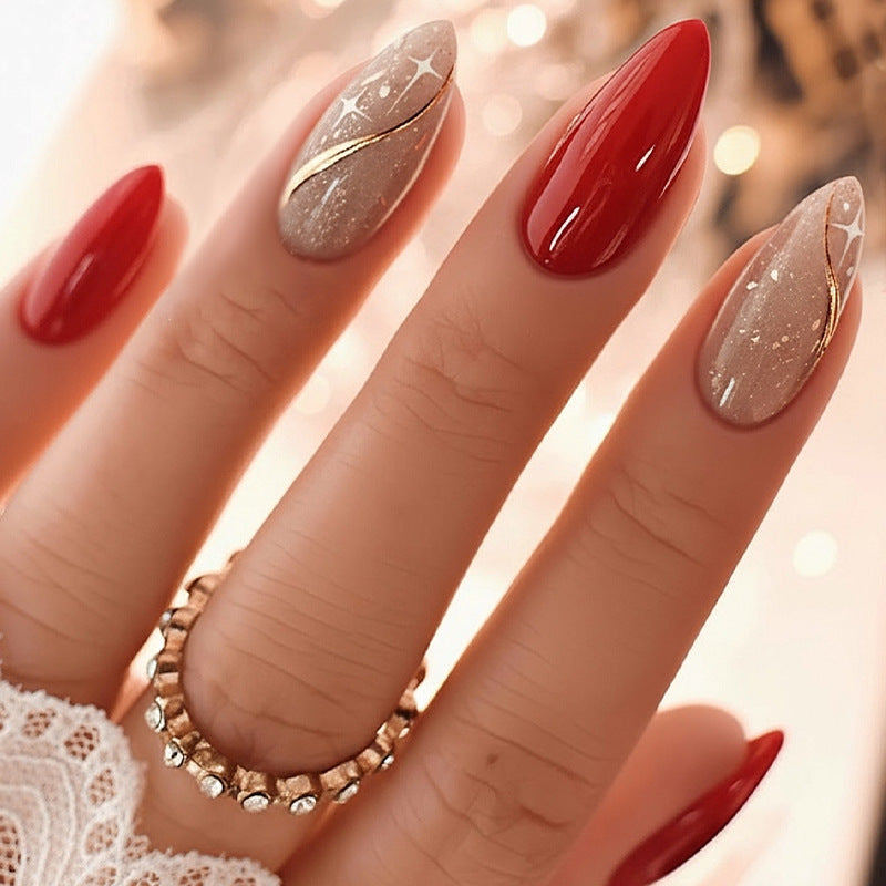 Kunstnagelset mit glänzender roter Oberfläche und stilvollen Akzenten Brehn