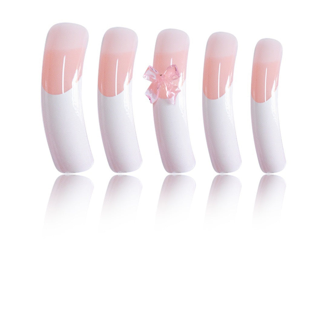 Elegante Nagelkunstverzierungen mit dekorativen Schleifenakzenten Brehn