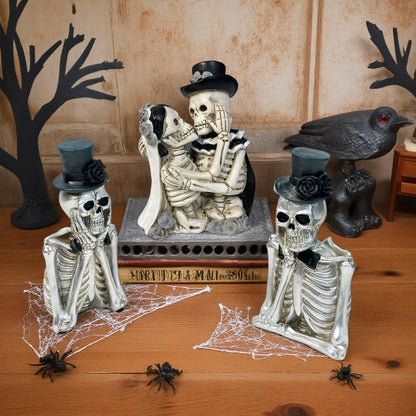 Stilvolle Skelettfigur mit Zylinder und schwarzer Rose Brehn