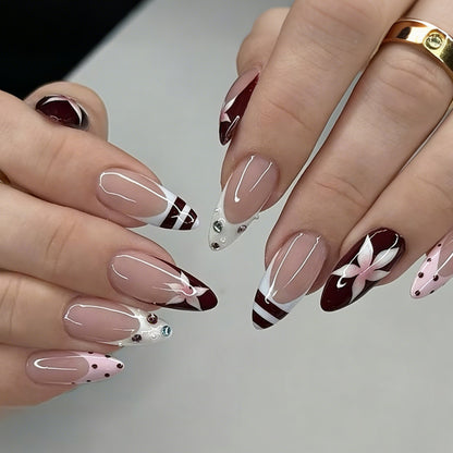 Kunstnagelset mit floralem Design und Glitzerakzenten Brehn