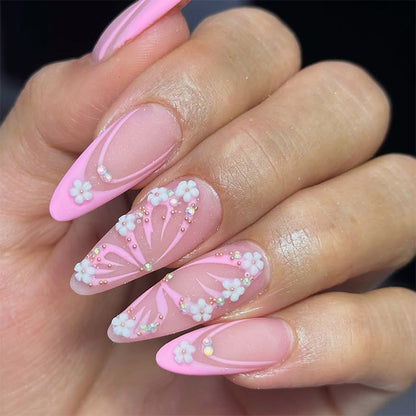 Kunstnagelset mit eleganten Blüten- und Glitzerverzierungen Brehn