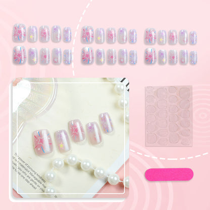 Künstlerisches Press-On-Nagelset mit himmlischen Designs