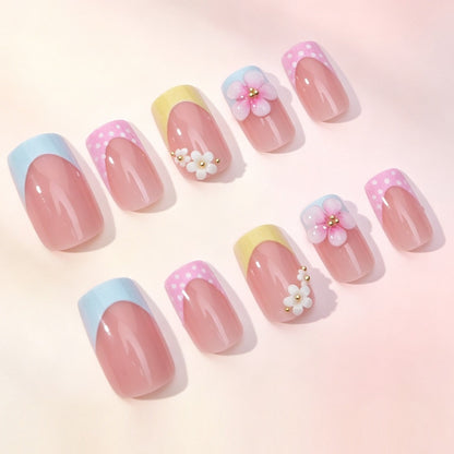 Kunstnagelset mit floralen Akzenten und bunten Spitzen Brehn