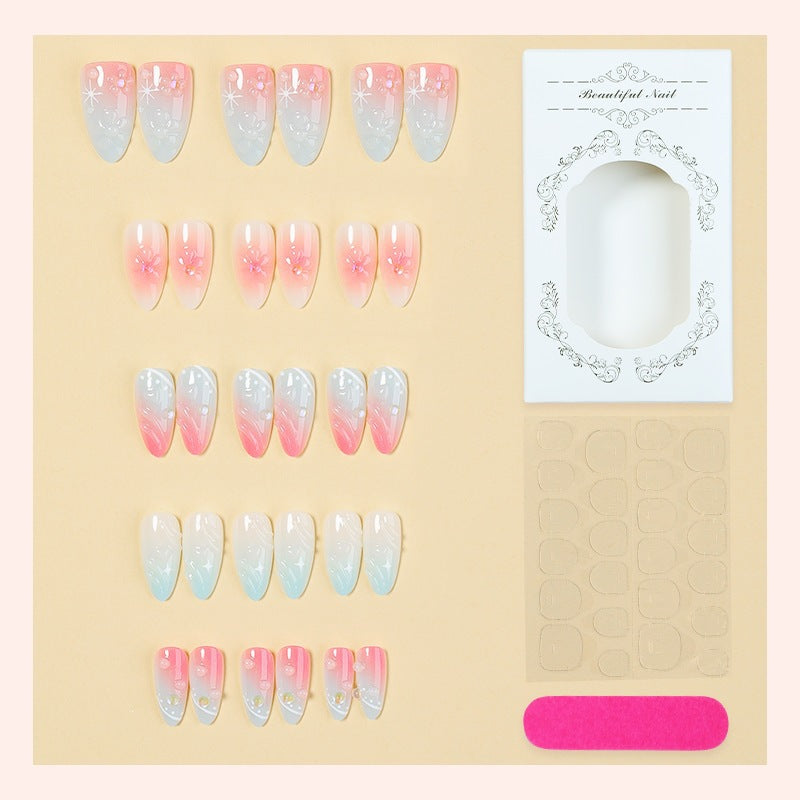 Kunstnagelset mit elegantem Ombre-Design und Blütenverzierungen Brehn