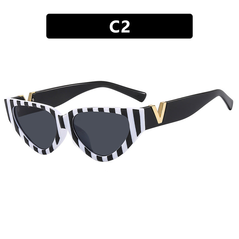 Damen Cat-Eye Sonnenbrille mit stylishem Zebra-Design und luxuriösen Akzenten Brehn