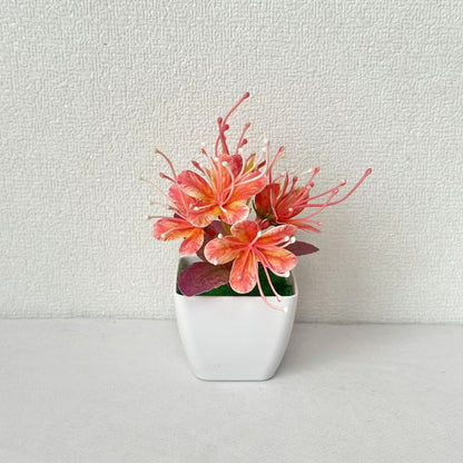 Lebensechte florale Tischmitte für die innere Wohnkultur