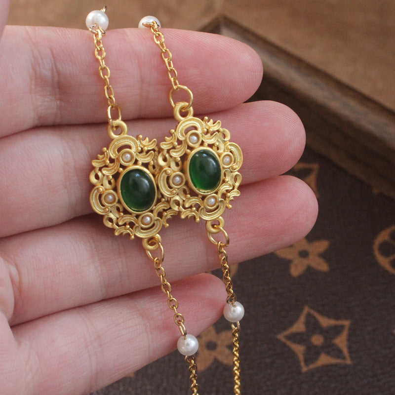 Elegante Schmuckhalterkette mit Perlen und Grüner Steindekoration Brehn