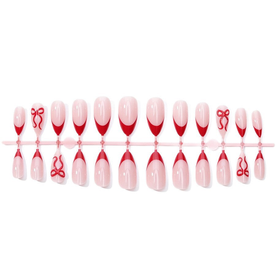 Kunstnagelset mit elegantem Motiv und Glitzerakzenten Brehn