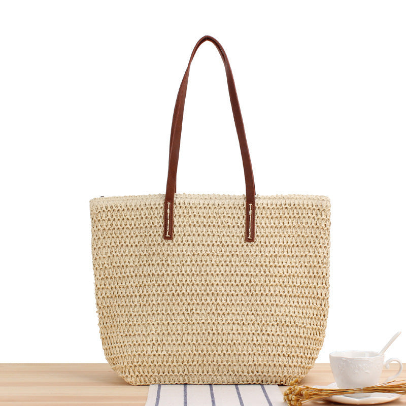 Elegante Bast-Handtasche mit Ledergriffen Brehn